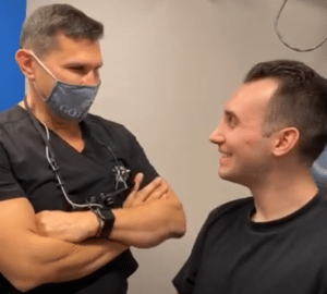 plastic surgeon, Dr. Philip Miller consulting with a patient in NYC